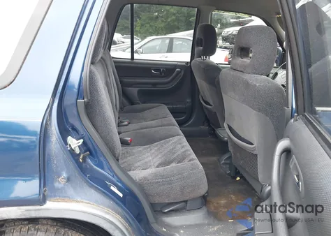 1999 Honda Cr-V Ex z USA, uszkodzony, nr VIN JHLRD1863XC065284